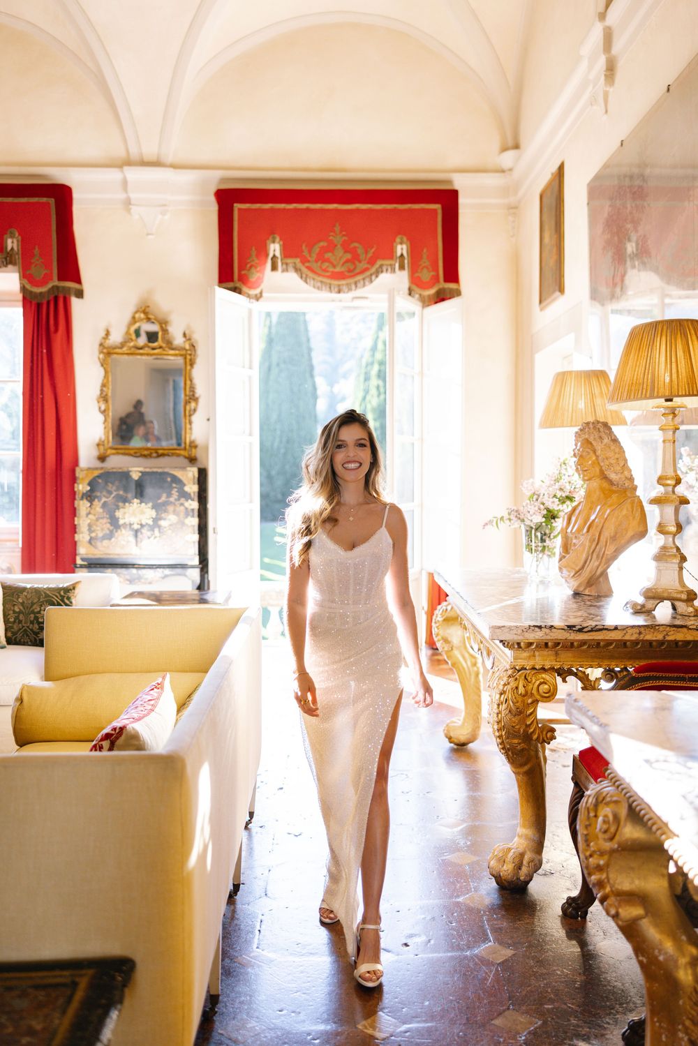 A sequence of elegant interior shots showing a white dress in a sunlit room with luxurious furnishings.