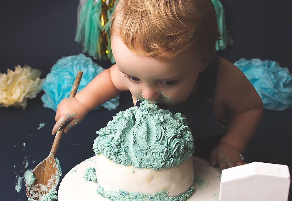 Progressive shots of messy cake eating with mint green frosting and decorative teal garlands.