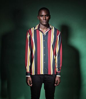 A series of fashion portraits showing a person wearing a colorful vertically striped shirt against a dark green background.