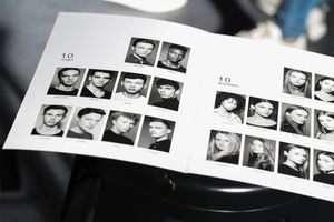 A black and white contact sheet showing multiple headshot portraits arranged in rows.