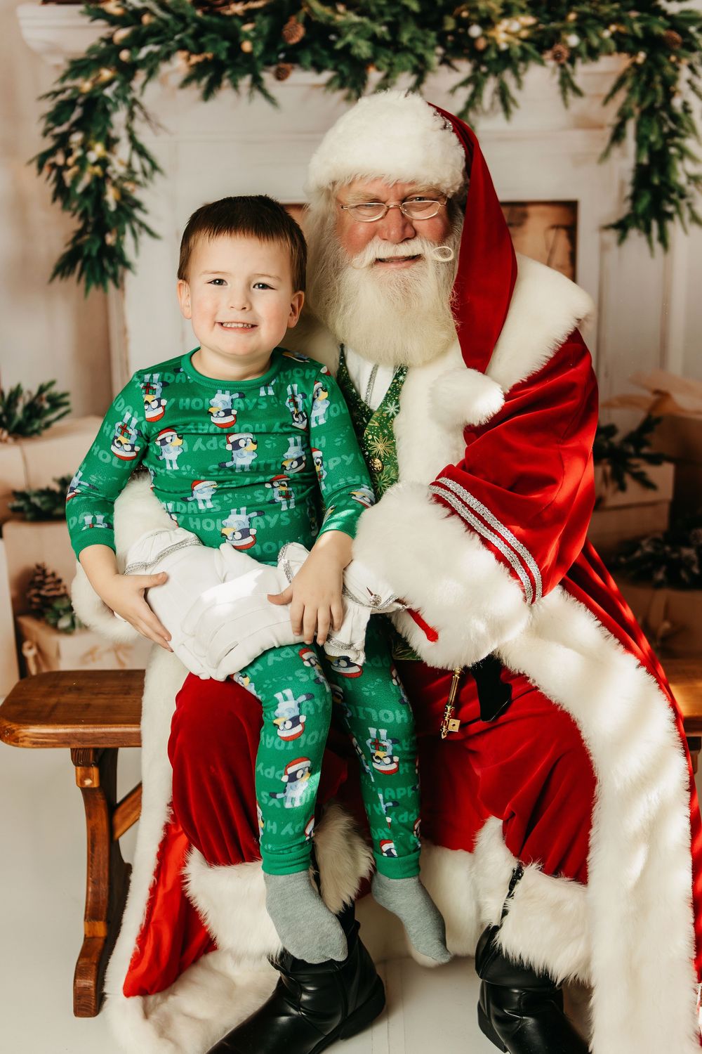A series of holiday photos showing a small child in green pajamas sitting with Santa Claus on a wooden bench.