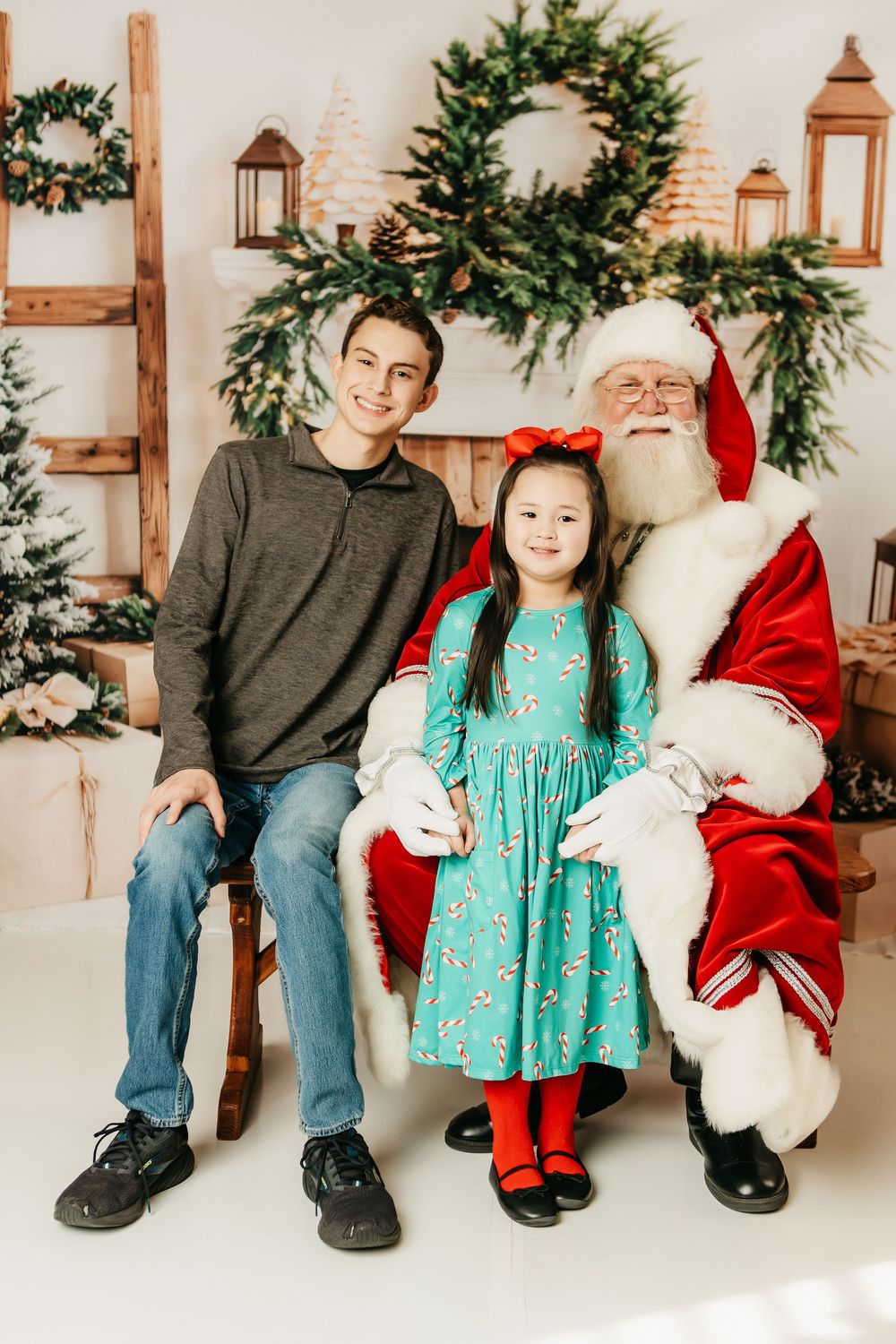 A series of Christmas photos showing a festive scene with Santa Claus and visitors against a white backdrop with holiday decor.