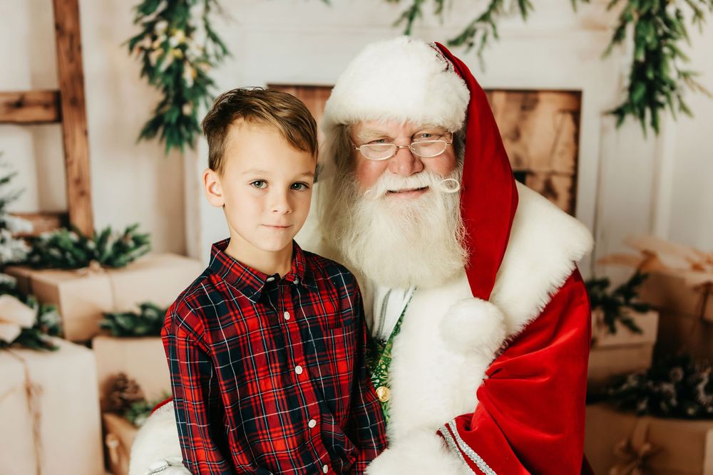 A festive holiday scene with a traditional Santa Claus figure and plaid decor in a rustic setting.