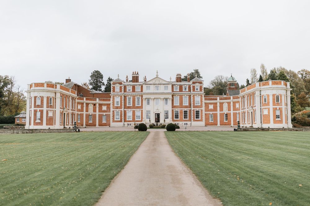 A panoramic collage showing multiple views of a grand historic mansion with red brick facade and manicured lawns.