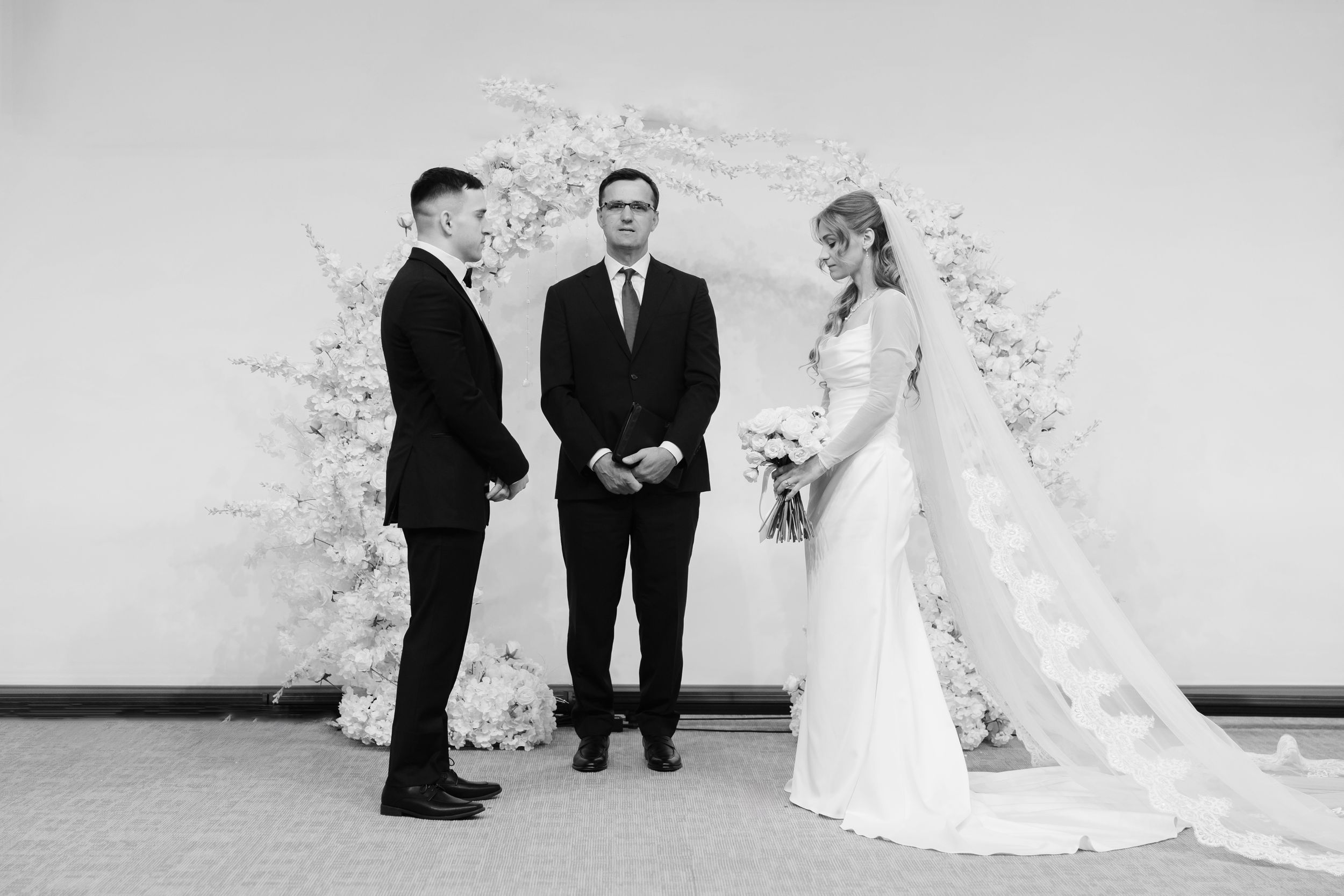Bride and groom during Ohio wedding ceremony photographed by Tom Forrest from Hudson, Ohio.