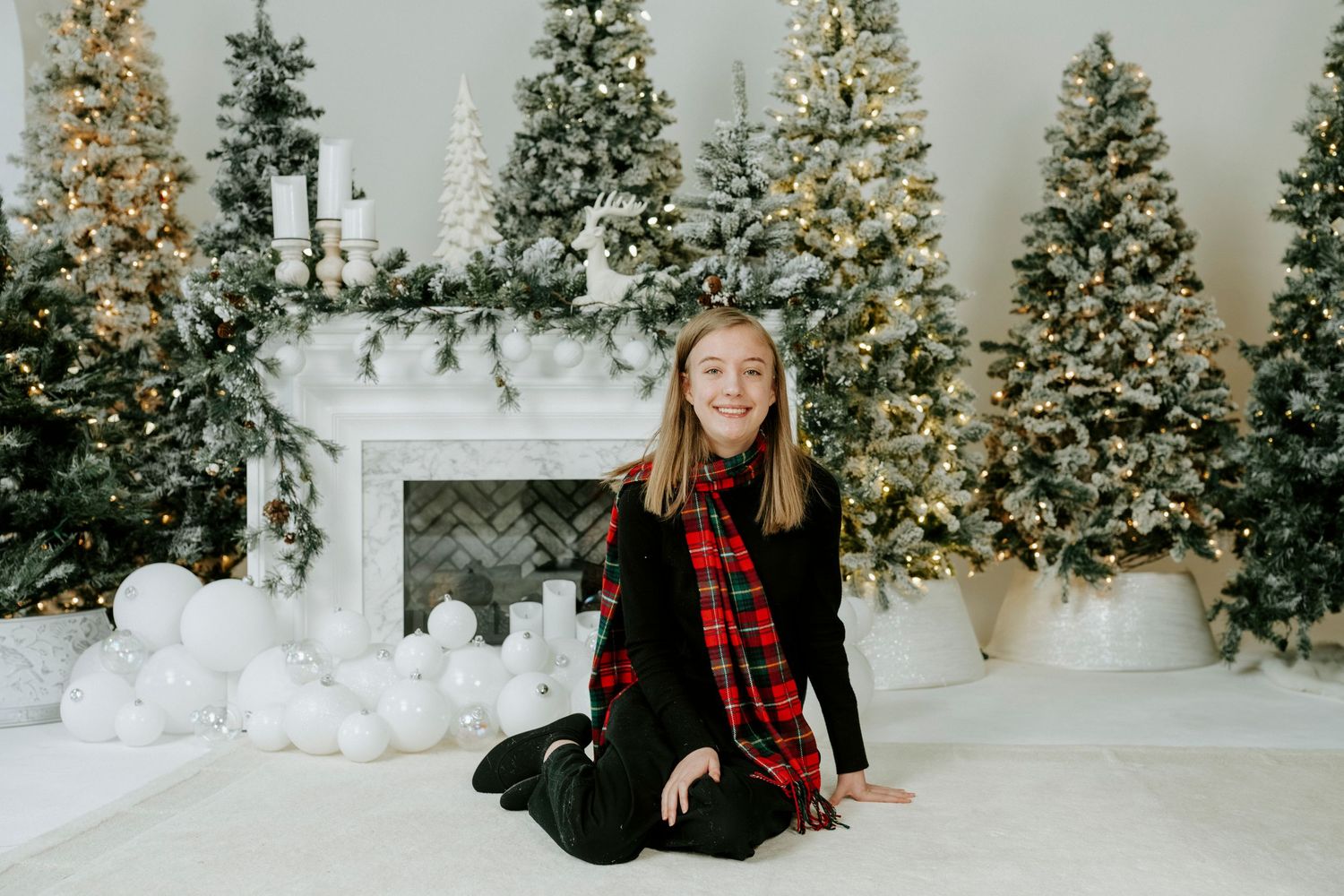 A festive holiday photo collage showing decorated Christmas trees and winter scenes in a bright white studio setting.