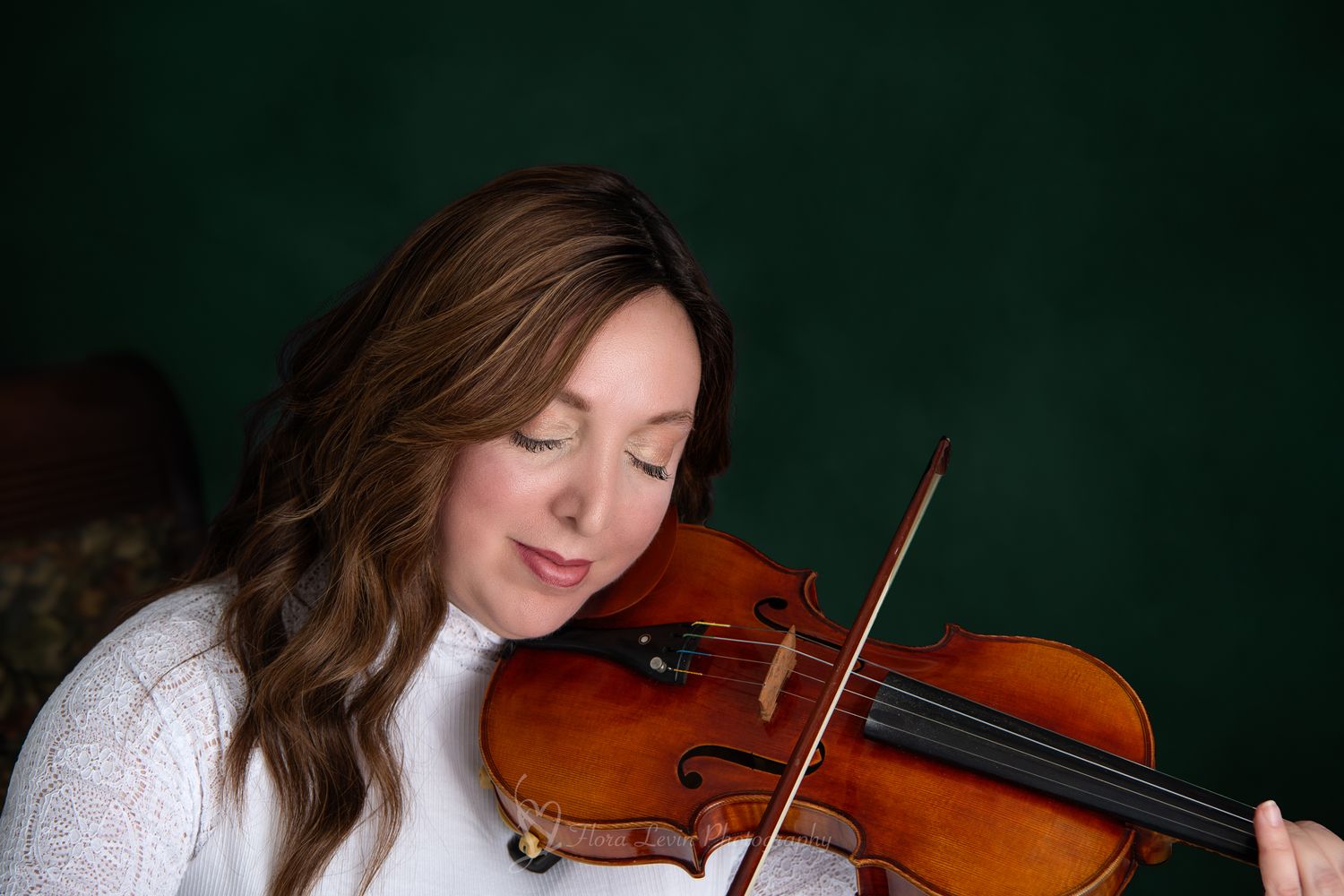 Female Violinist playing the violin.