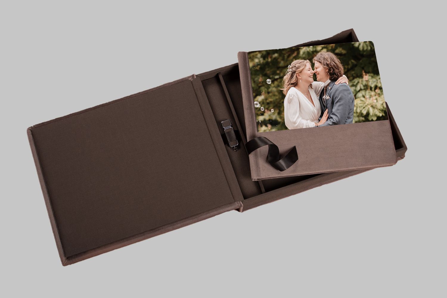 A romantic couple embraces and kisses on a brown leather couch in an intimate sequence of photos.