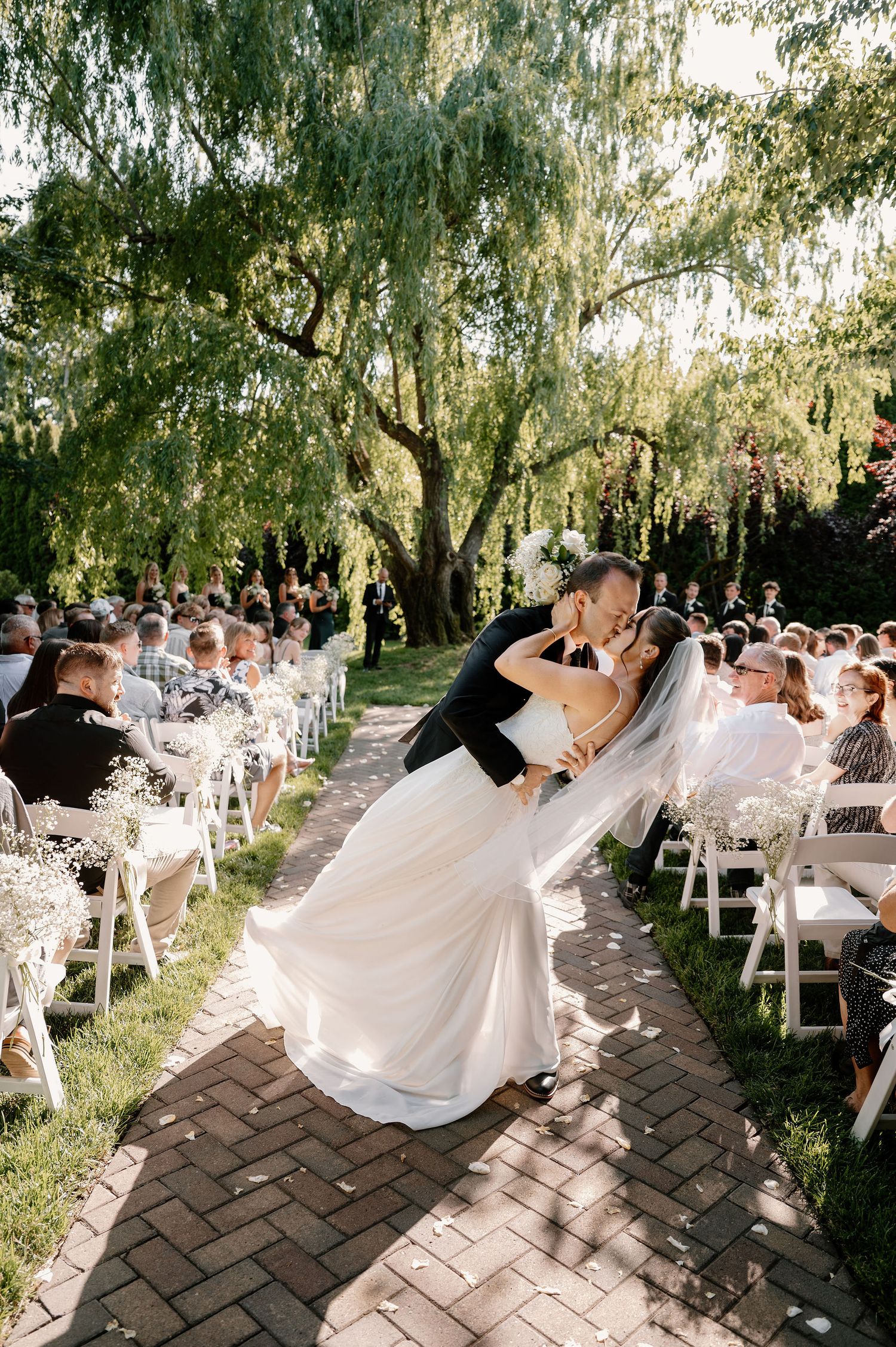 Summer wedding ceremony at Promise Garden in Pasco
