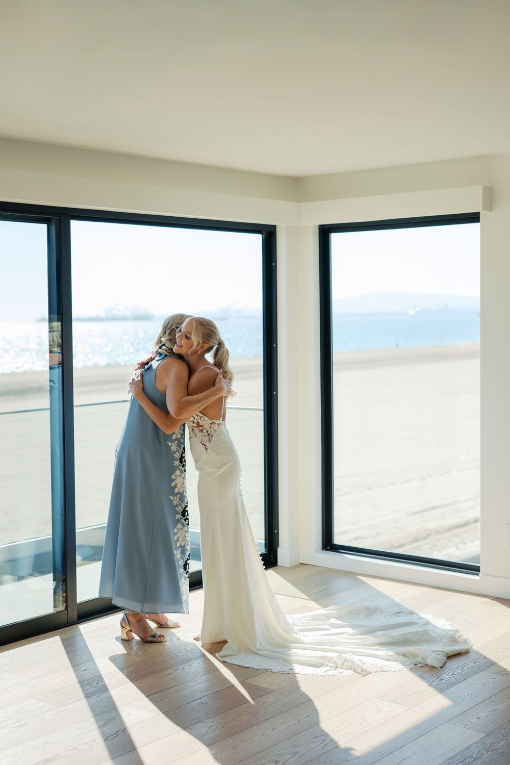 Sequential photos of someone in preparation showing steaming or pressing a white dress by a window.