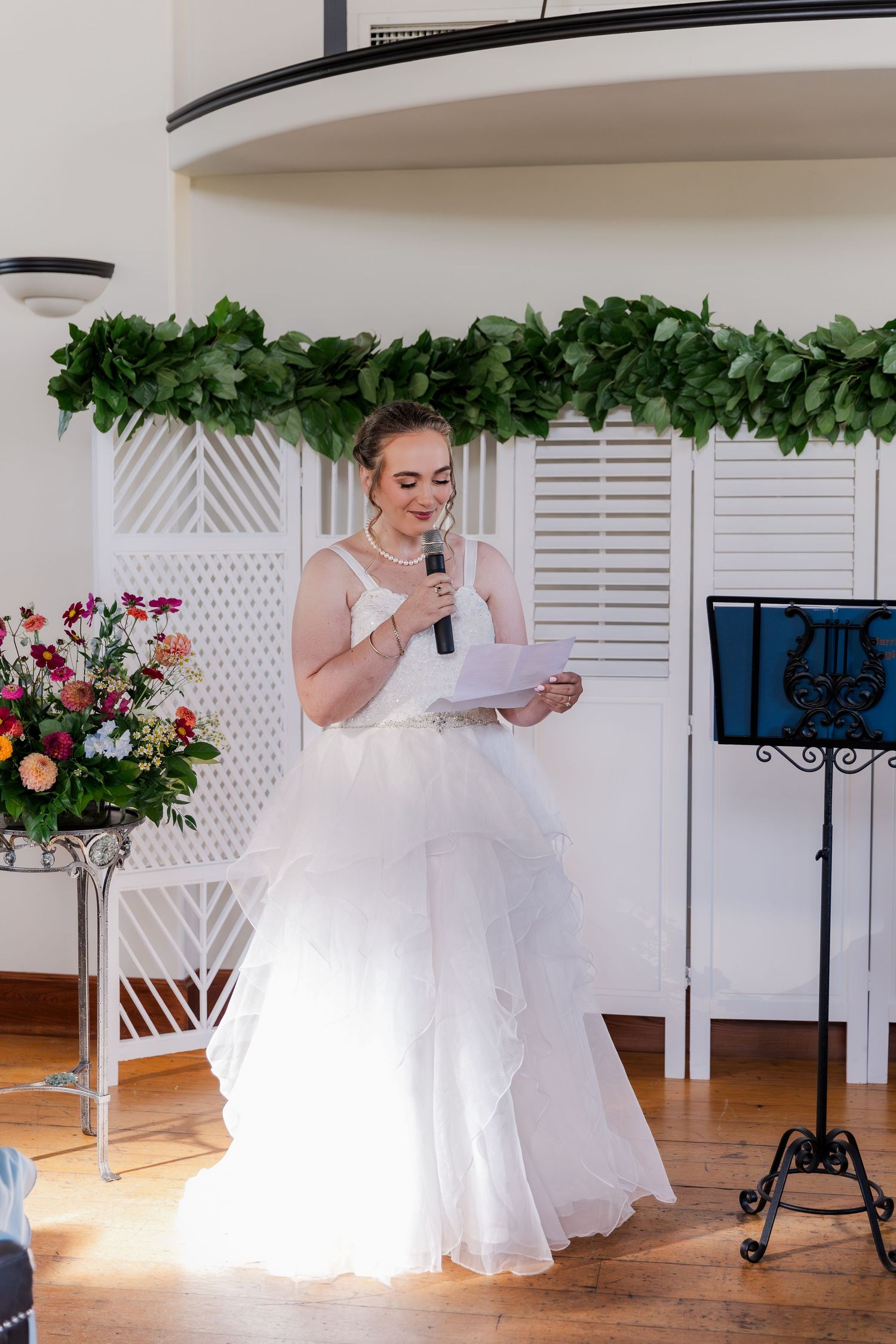 Bride reading her personalized vows at Hauser Hall in Kitchener, Ontario.
