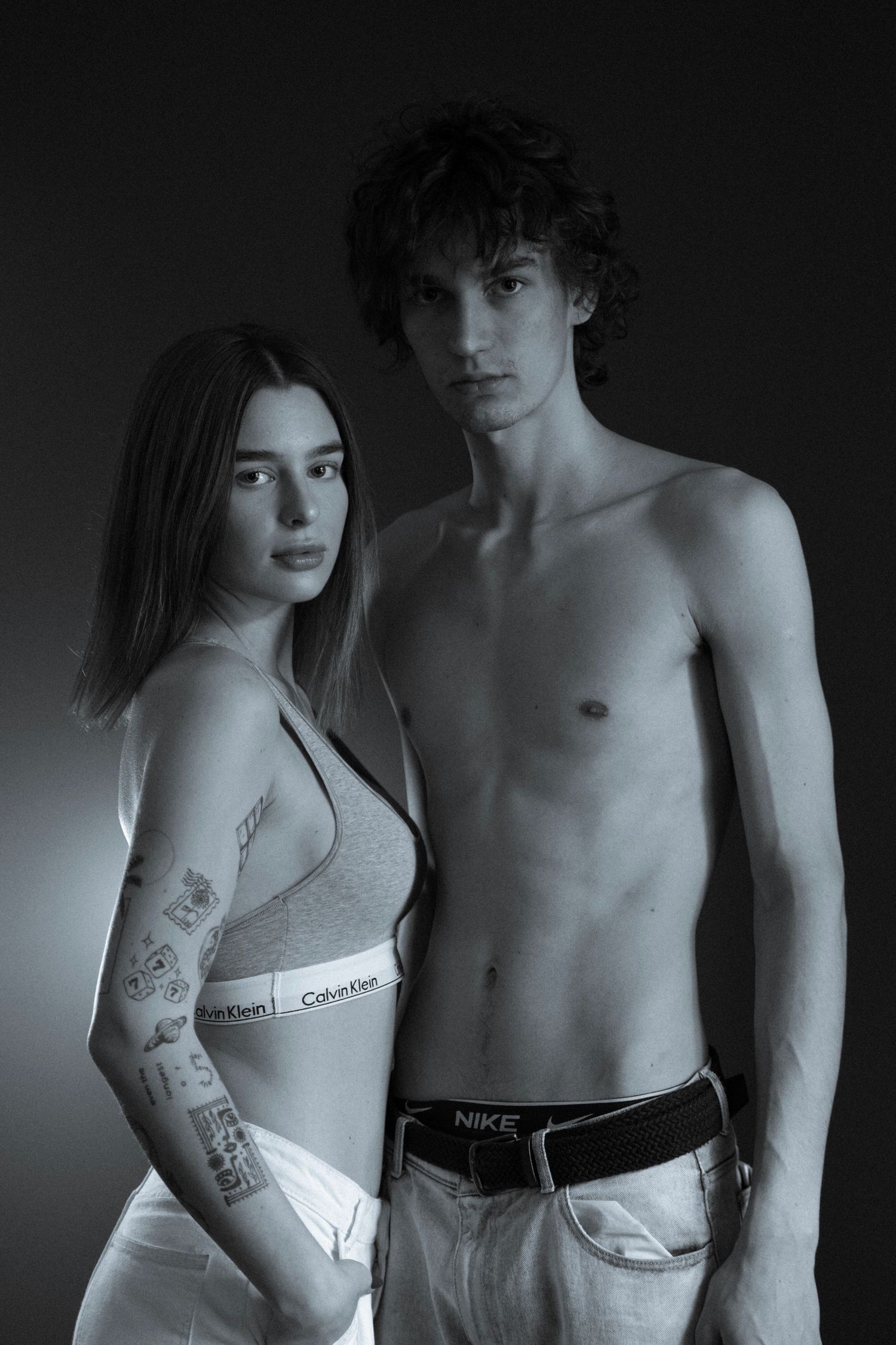 Moody black and white fashion portraits featuring Calvin Klein apparel.