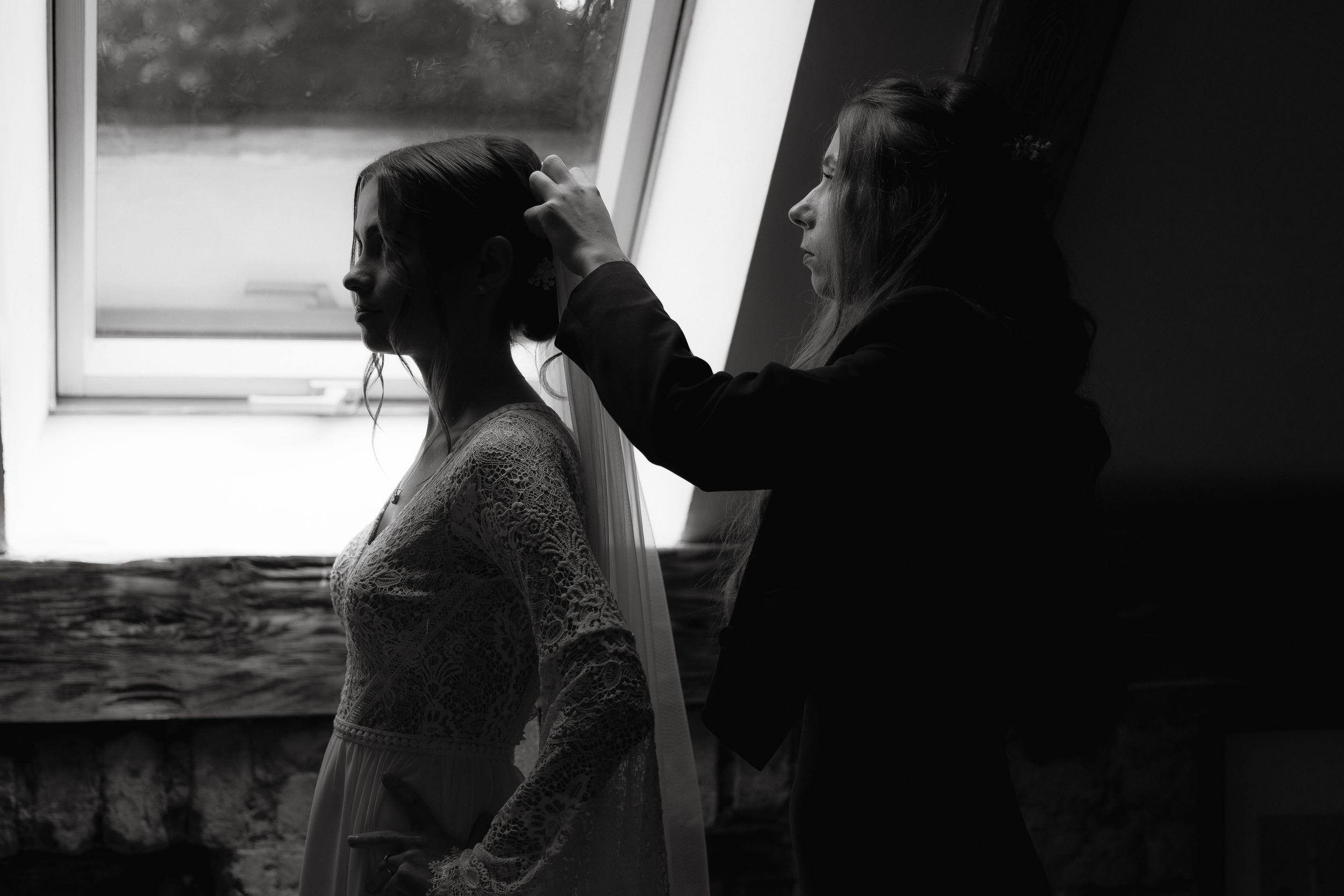 A series of five black and white photographs showing a couple embracing and dancing in vintage style.