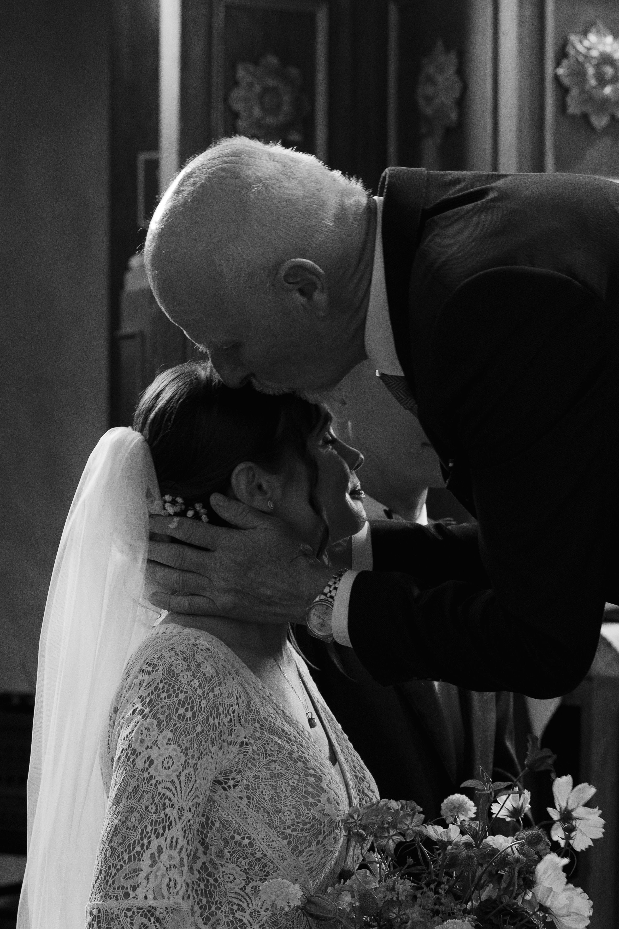 Black and white wedding photo sequence showing tender intimate moments between couple during ceremony.