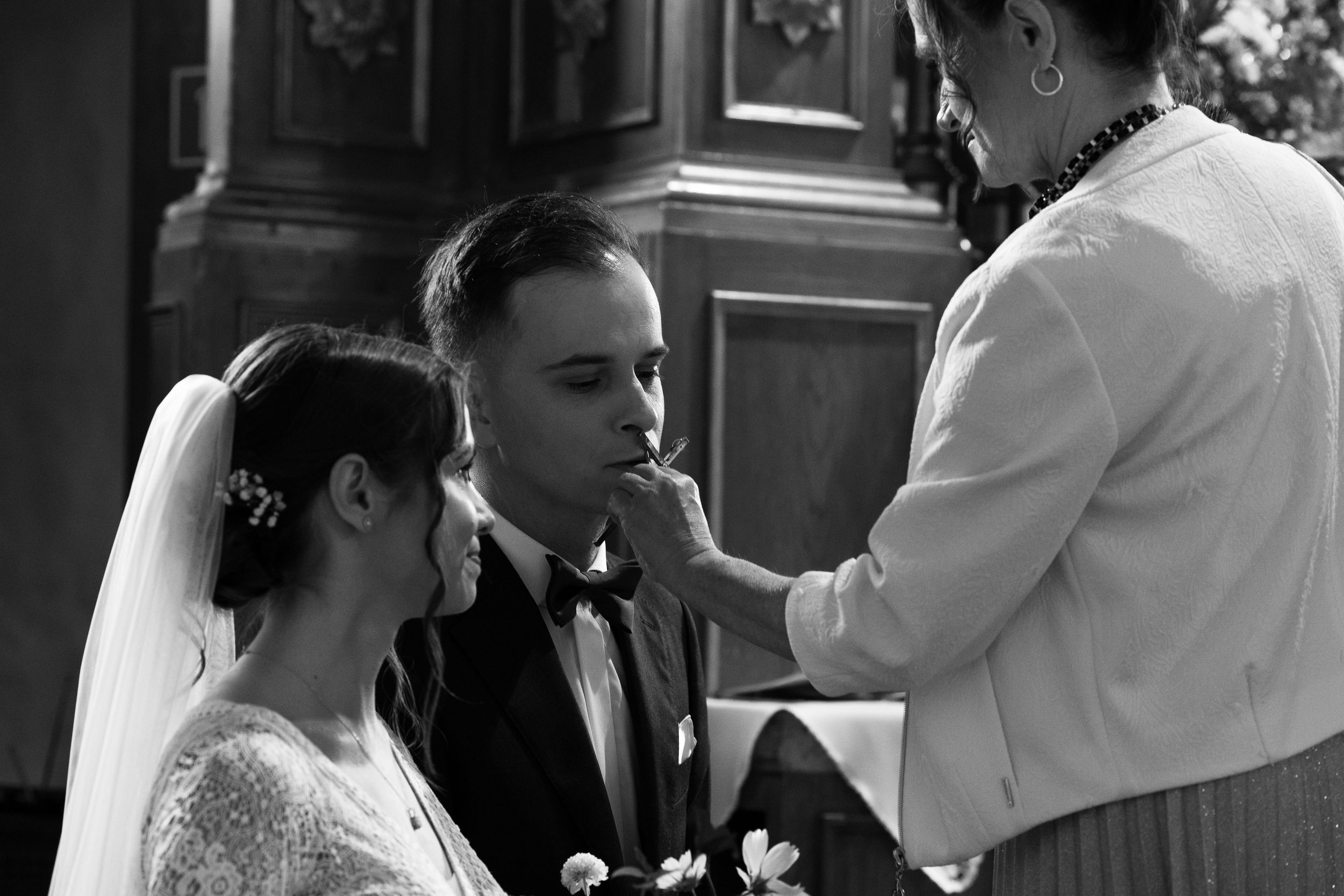 Elegant black and white wedding photographs arranged in a dreamy collage of joyful moments and romantic embraces.