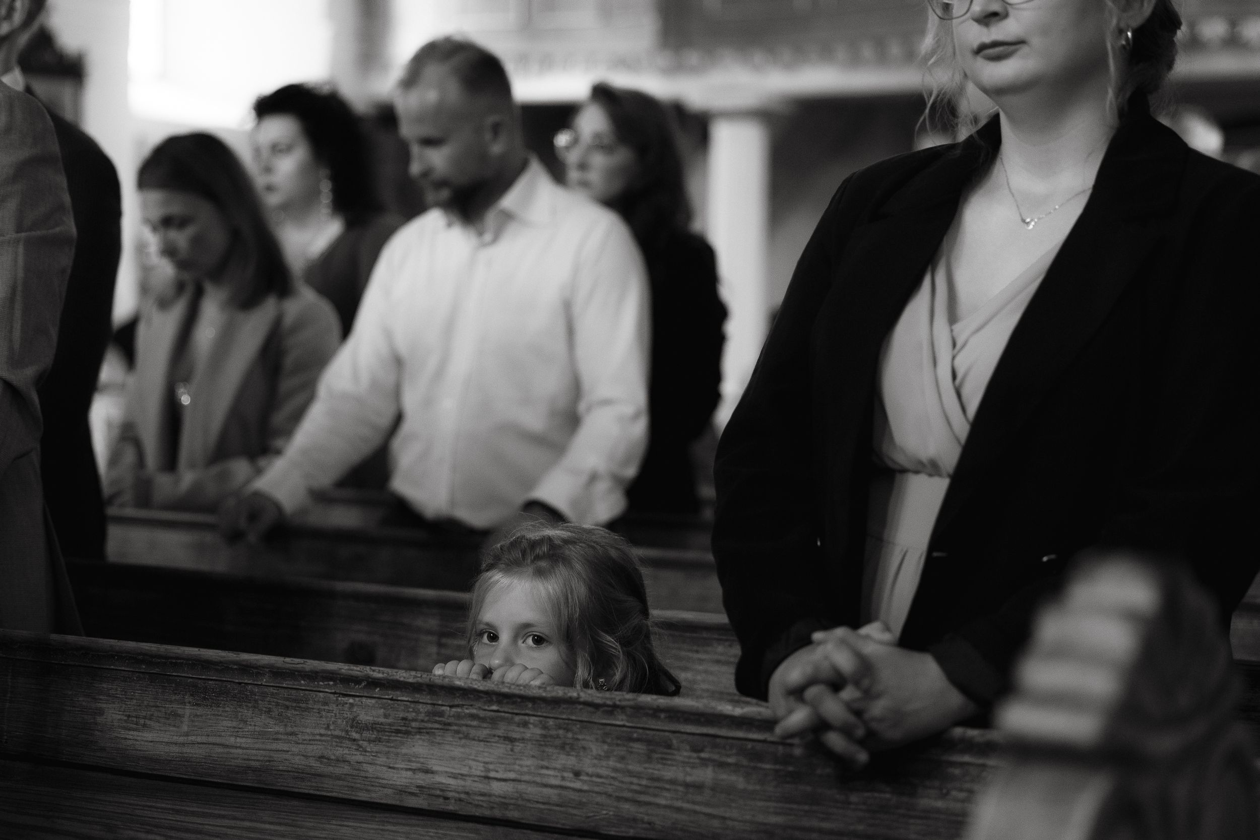 Vintage black and white photos show people gathered at what appears to be a church service or religious ceremony.