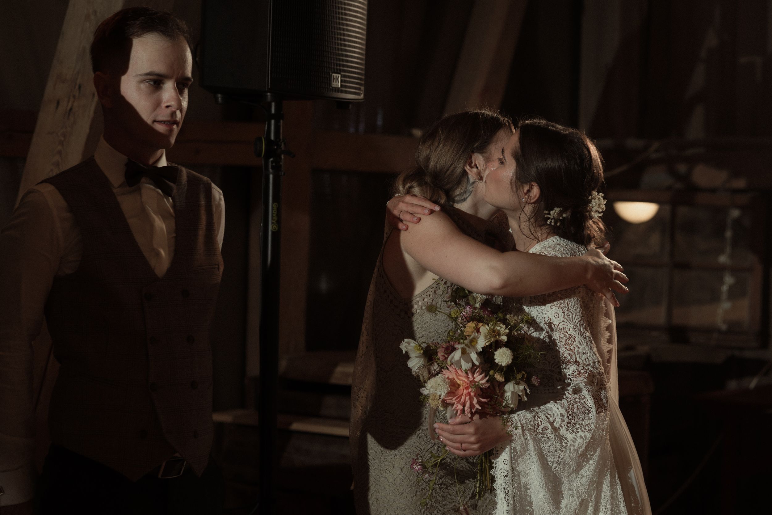 A couple performs an intimate dance scene in what appears to be a romantic period drama film or television show.