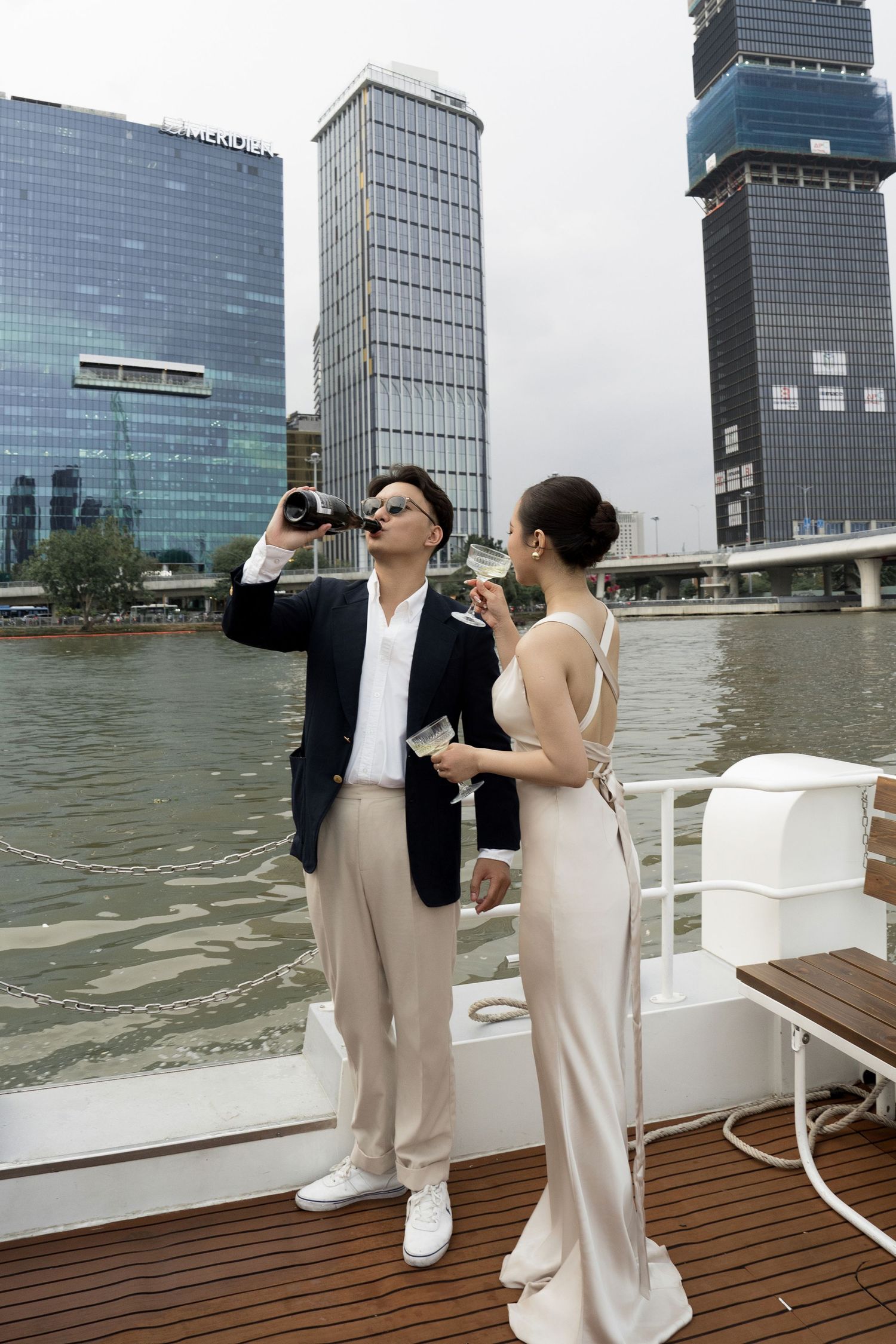 alt="Couple prewedding photoshoot at harbor & yachts"