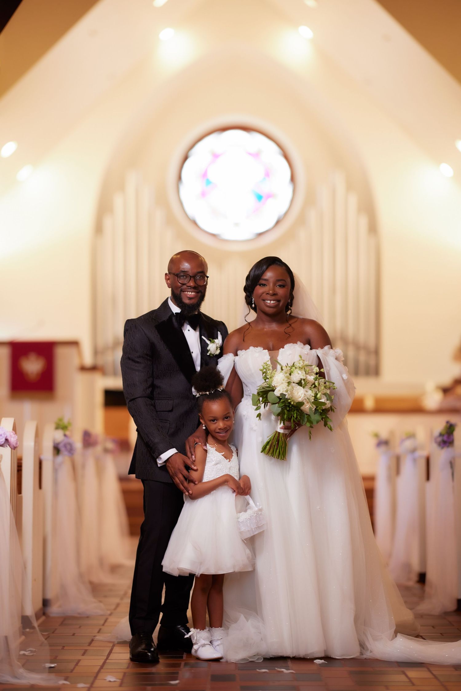 Three elegant photos from a church wedding ceremony showing poses of the couple and a young attendant in white dress.