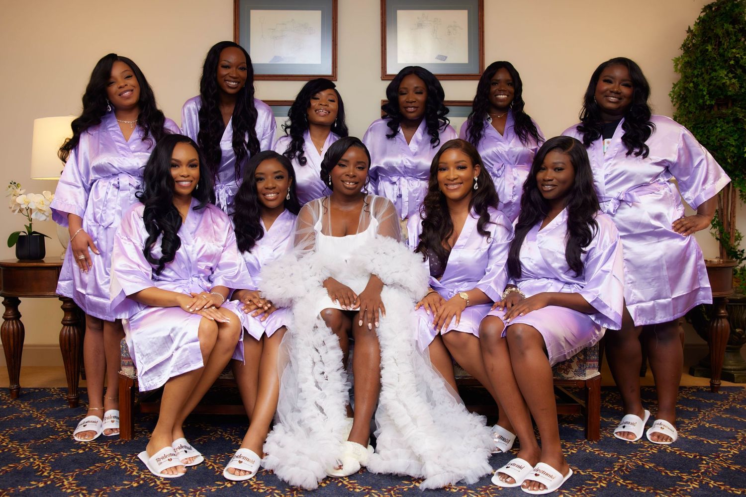 A collage of bridesmaids in lilac satin robes posing together in different arrangements for wedding photos.