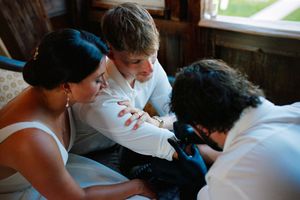 A sequence of intimate moments between a couple is captured in this wedding-themed black and white photo collage.