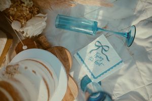 Scattered plastic bags and packaging materials lie on a messy surface creating environmental waste.
