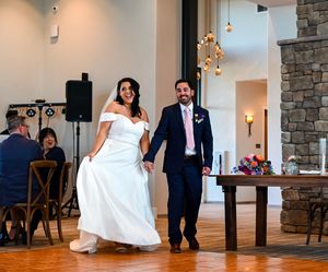 A panoramic collage of wedding scenes featuring couples dancing and celebrating in an elegant reception venue with stone walls.