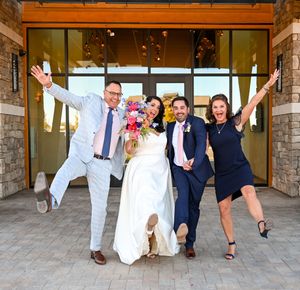 A playful panoramic wedding photo collage showing guests and wedding party jumping and posing under an outdoor portico.