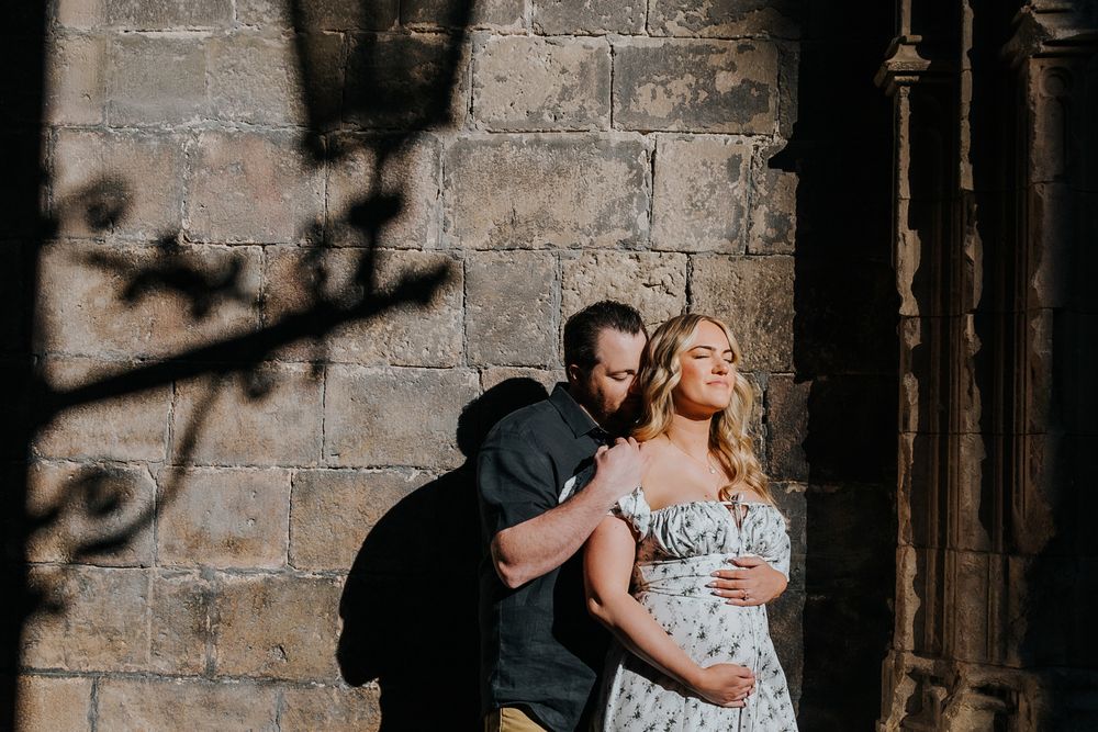Gentle embrace during maternity session in Old City