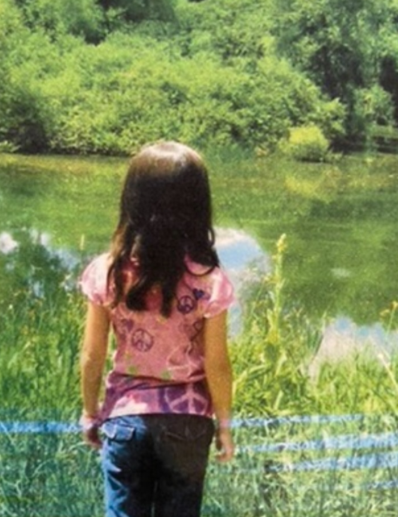 A series of photos showing someone in a pink shirt and jeans bending down near yellow wildflowers by a pond.