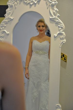 Checking out her dress