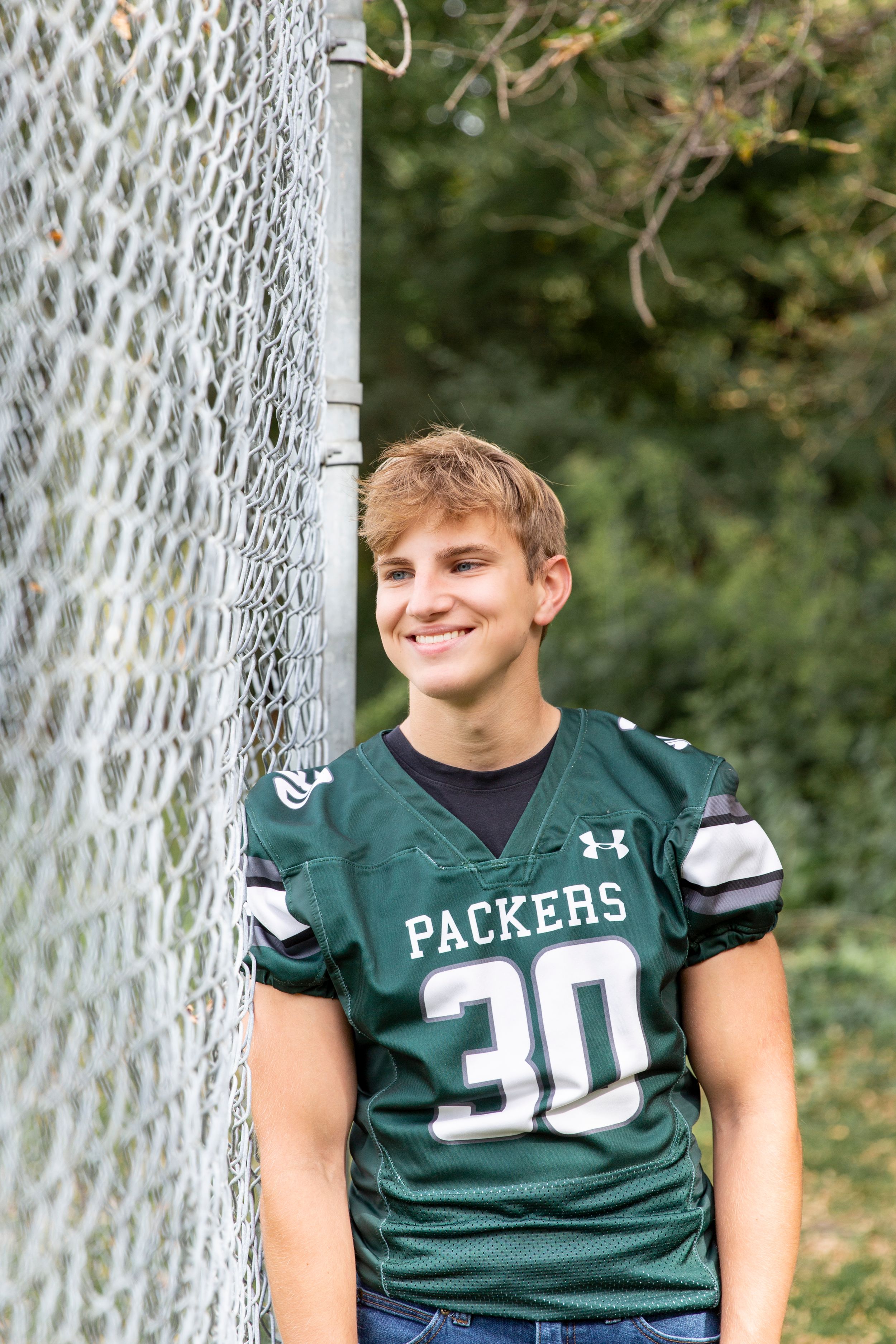 Football High school senior pictures in West Fargo, North Dakota