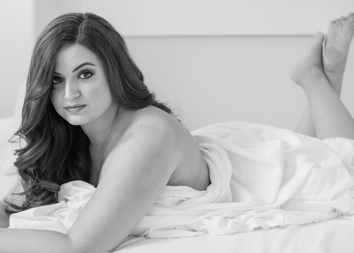 Boudoir photography by Soulful Portraits by Mayeluz in Charlotte, NC, celebrating confidence, beauty, and self-love with empowering photos.