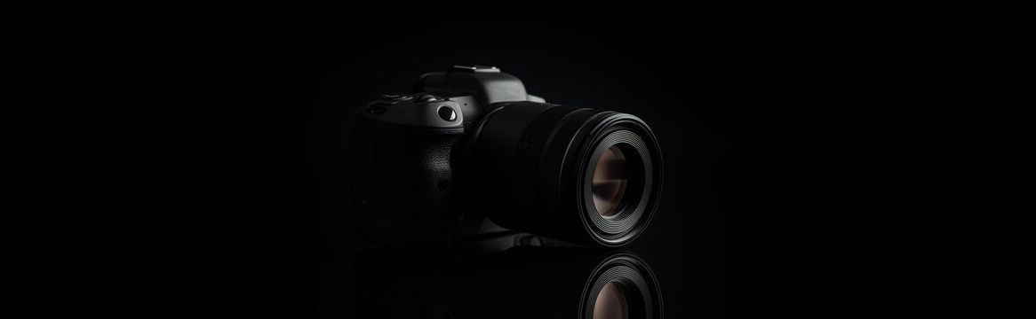 A professional DSLR camera with lens shown against a black reflective background.