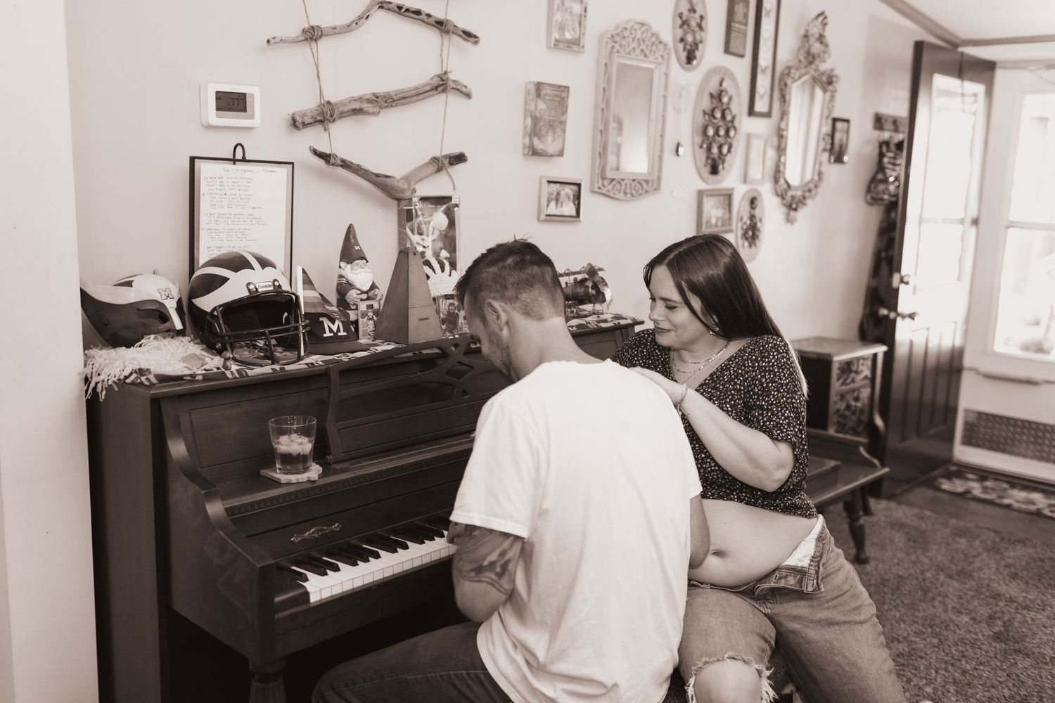 Family plays the piano during a lifestyle shoot at their home near Middletown, OH. Photographed by Vicci Photo of Dayton, OH