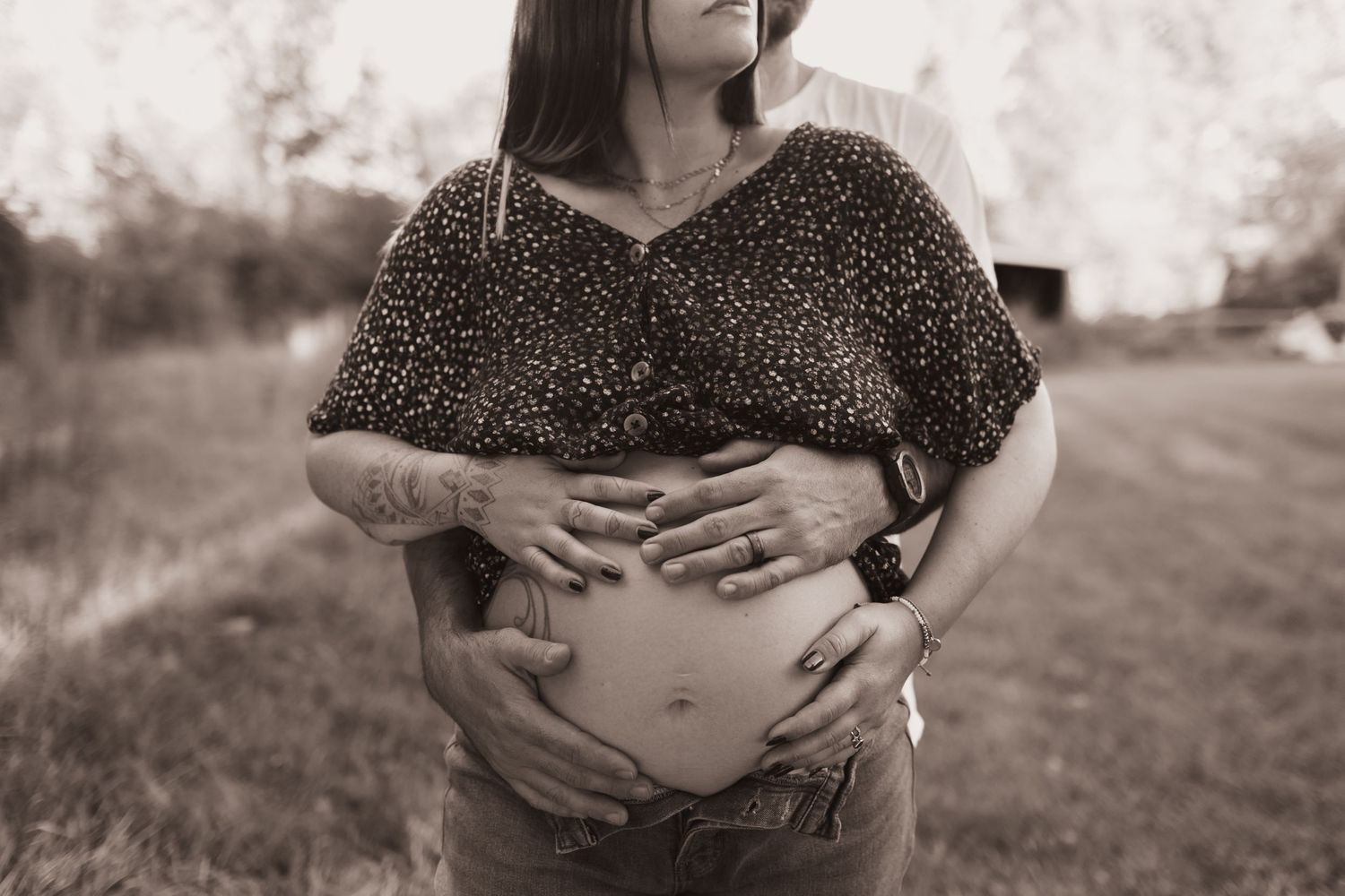 Pregnancy photo, mom and dad hugging for maternity pics at their home near Middletown, OH - Photographed by Vicci Photo of Dayton, OH