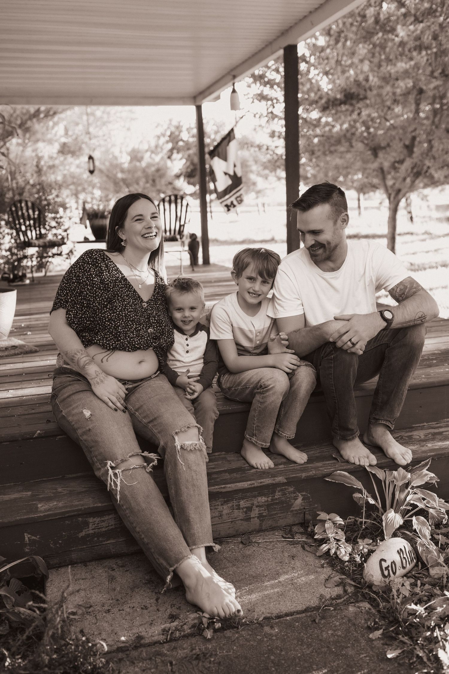 Family portrait on front steps of their home near Middletown, Ohio.  Photographed by Vicci Photo of Dayton, OH
