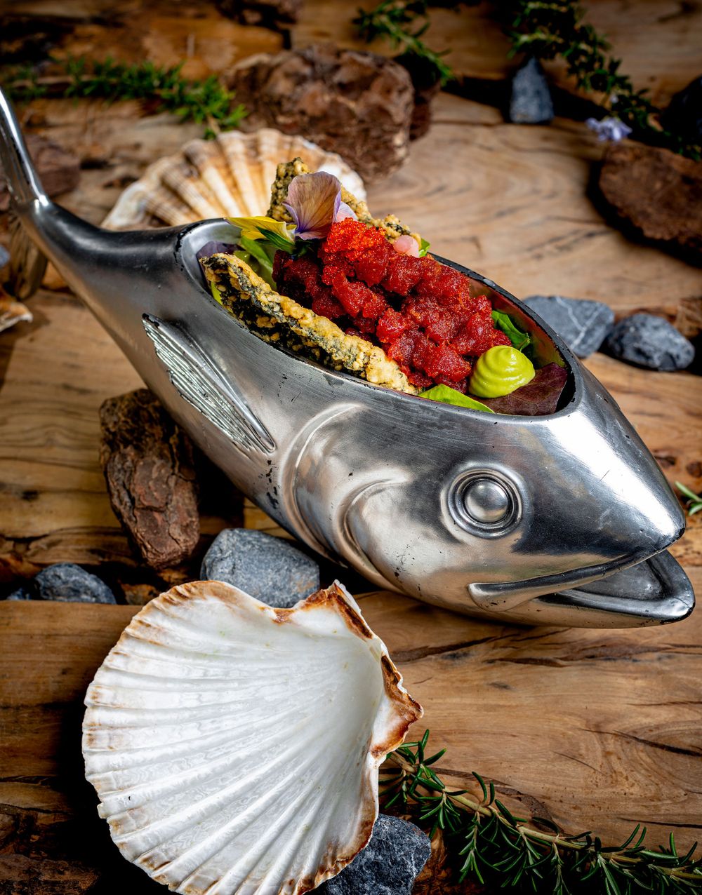 Elegant metal fish with sushi and gourmet food, designed for exclusive restaurants. Food photography in Marbella, Costa del Sol.