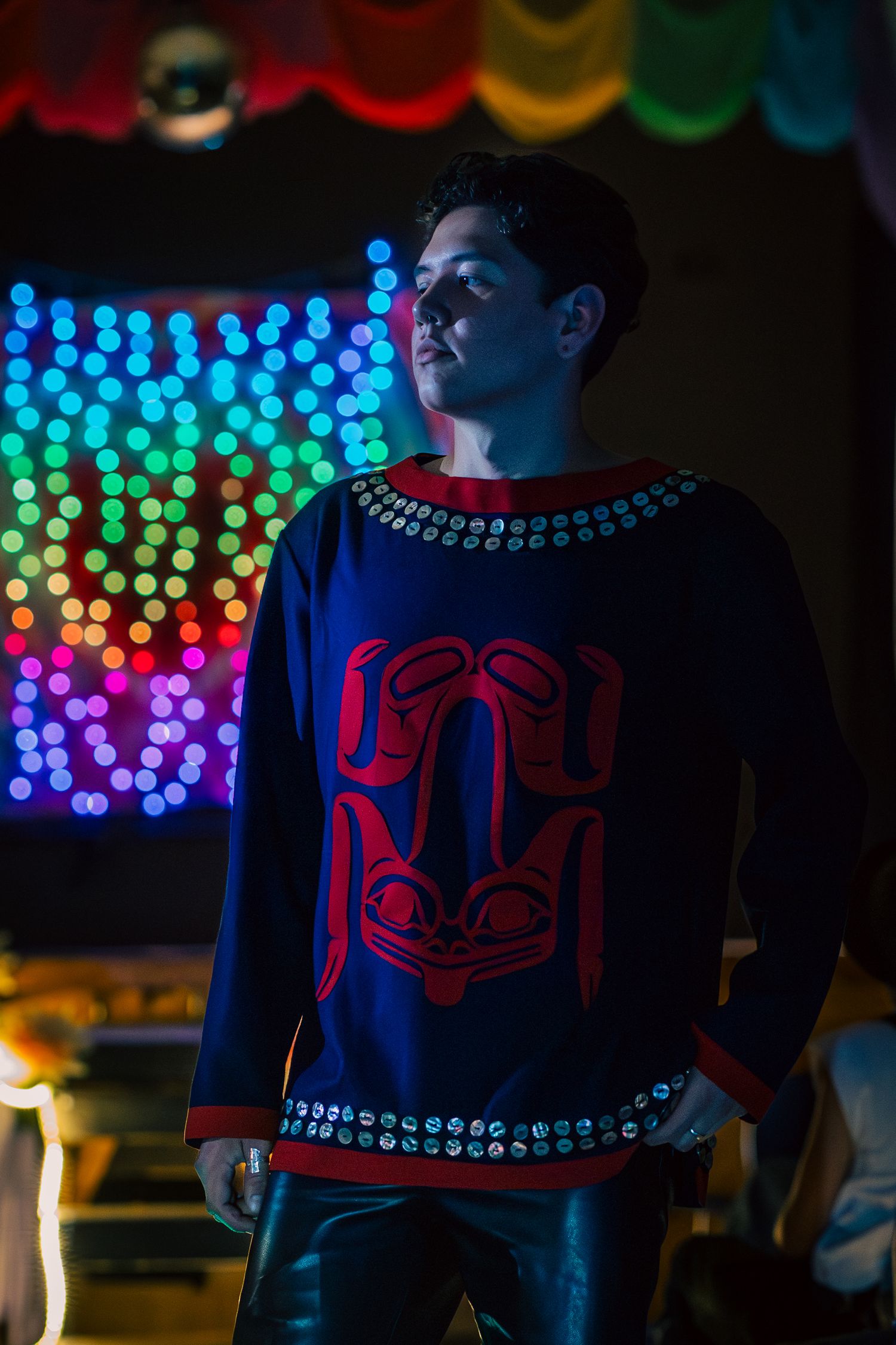 A detailed view of an intricate Nuxalk Blanket worn for a traditional wedding in Bella Coola, British Columbia.