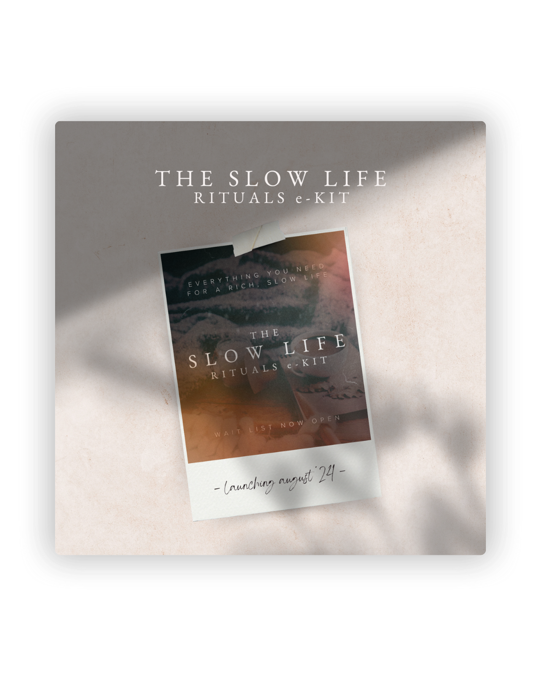 A book titled 'The Slow Life' lies on a white surface with soft shadows cast from natural lighting.