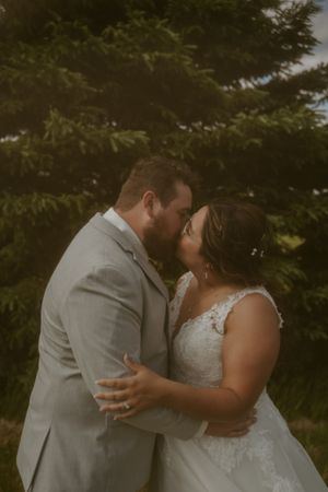 Tender moment between newlyweds captured in series of intimate poses.