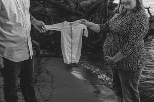 Black and white wedding ceremony photos showing moments between couples celebrating their special day outdoors.