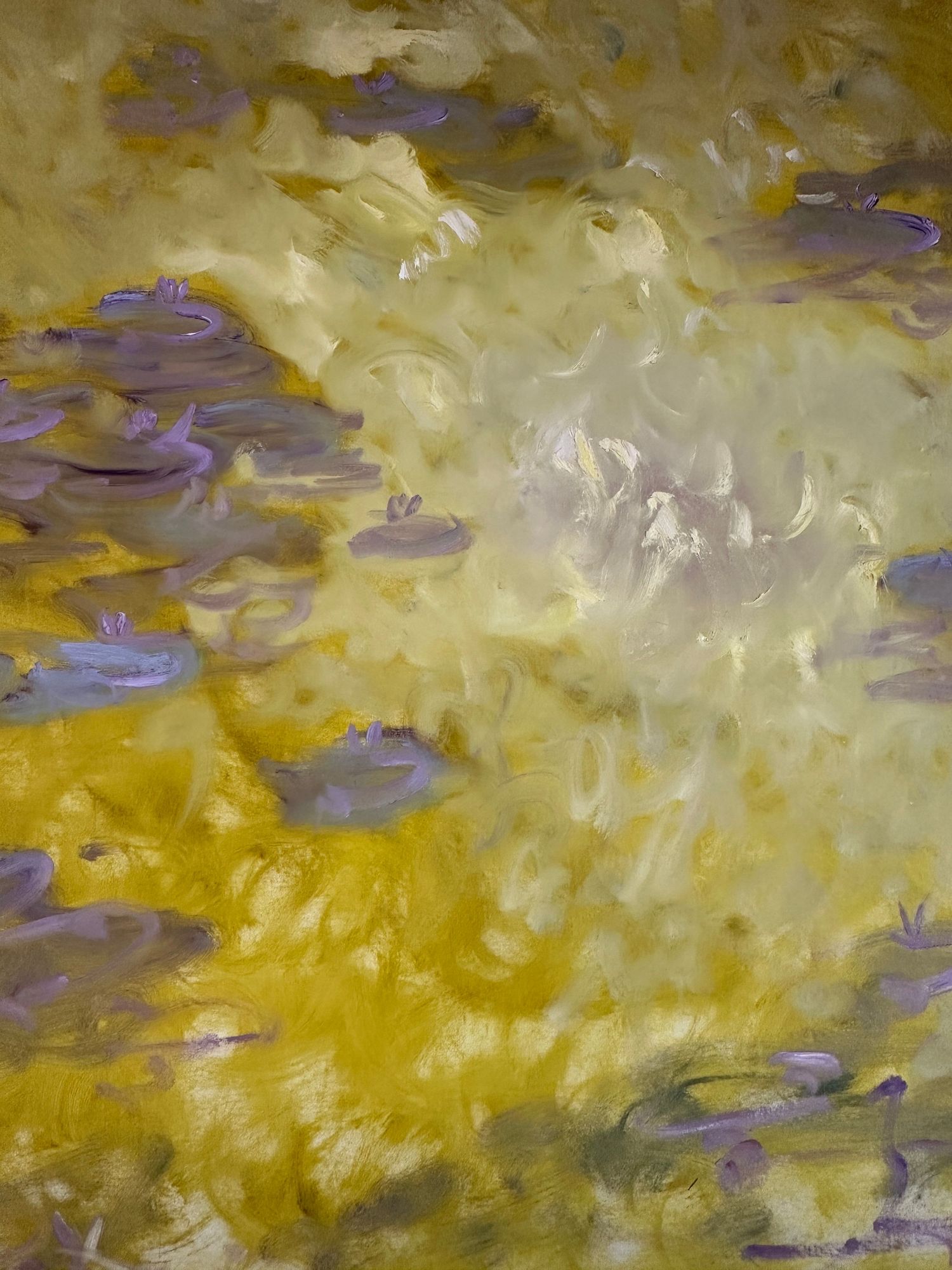 Abstract painting with swirls of yellow and purple, creating a dreamy atmospheric effect on canvas.