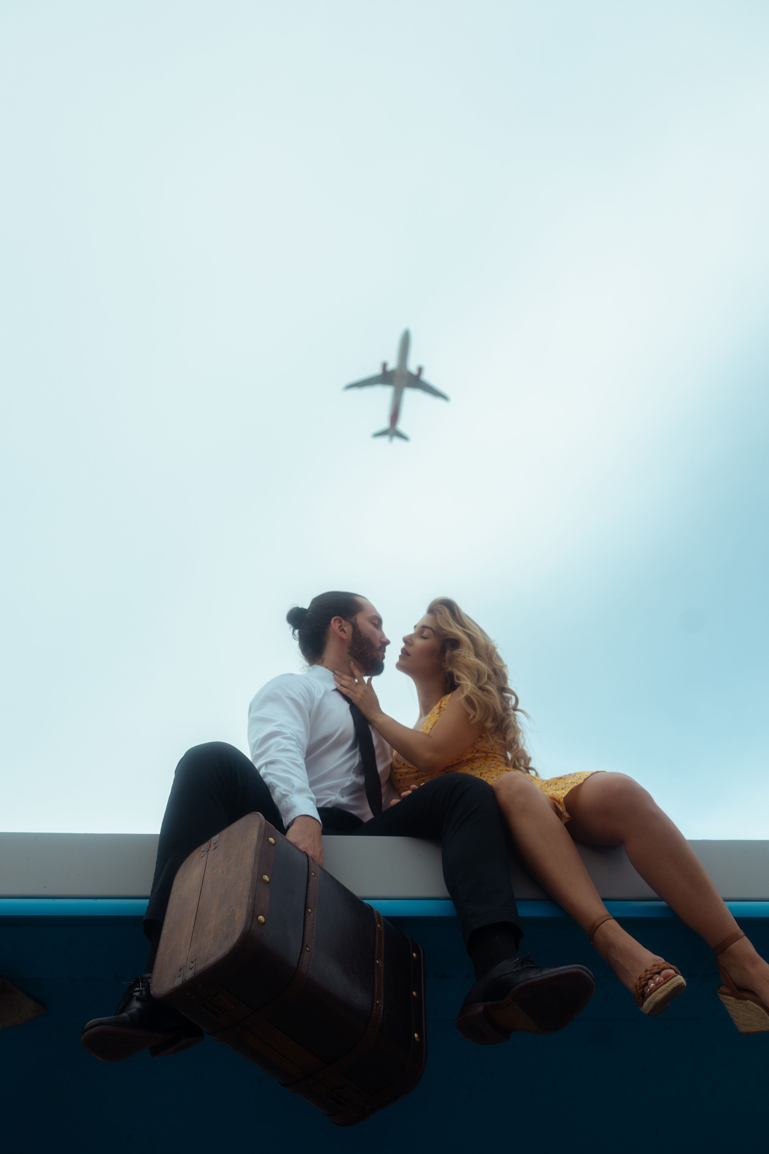 Unique Miami couple portrait with airplane flyover, cinematic engagement photography for Pinterest & Instagram by MannyPortraits