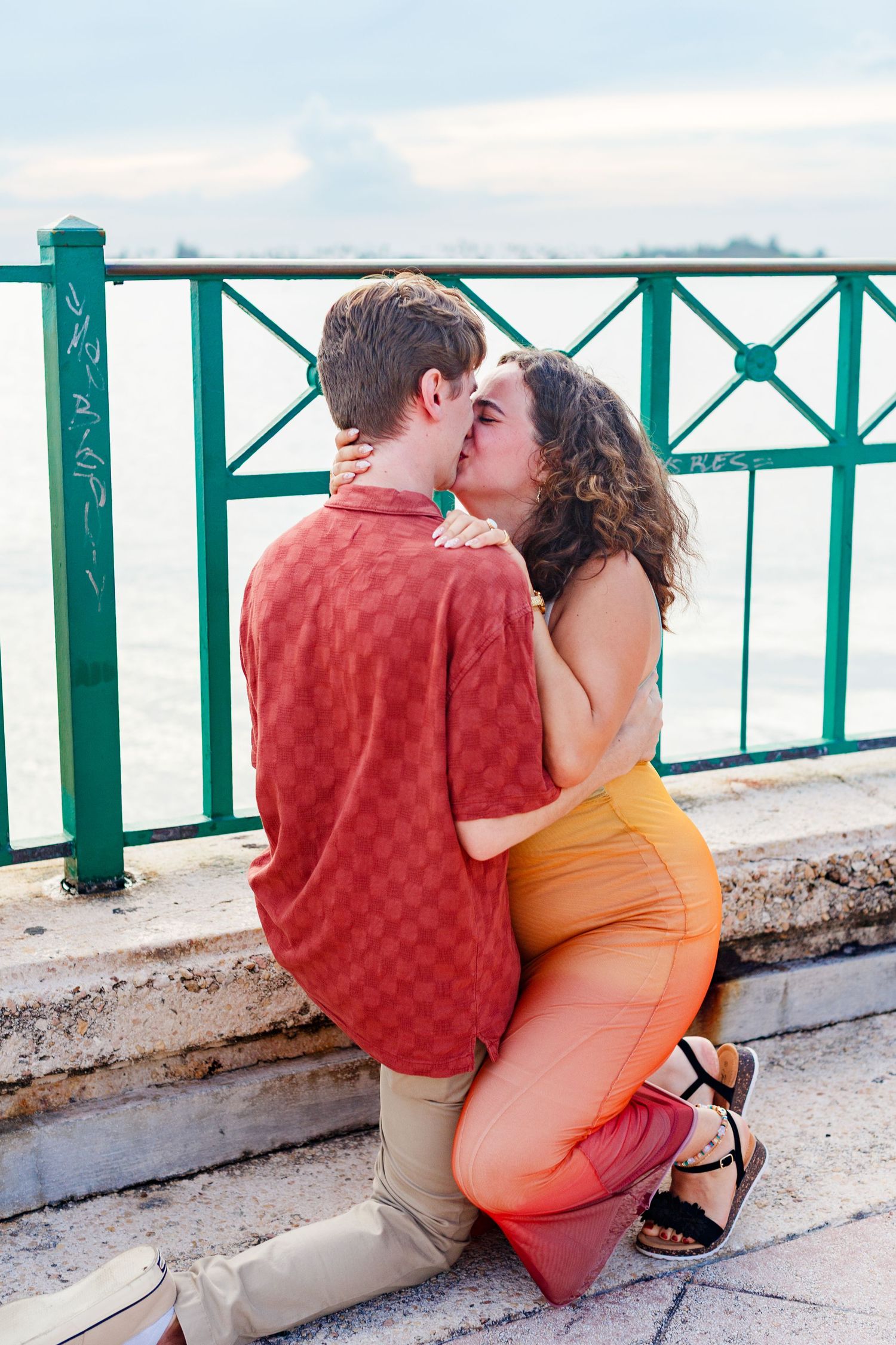 Surprise marriage proposal in Old San Juan, Puerto Rico. Paseo de la Princesa. Man and woman.