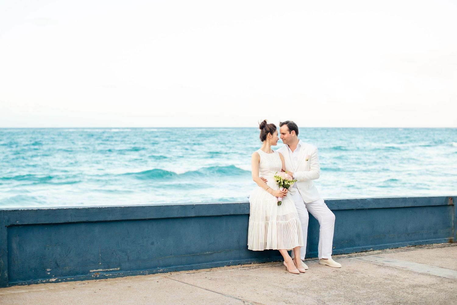 Bride and groom at the beach. Micro wedding in San Juan, Puerto Rico.