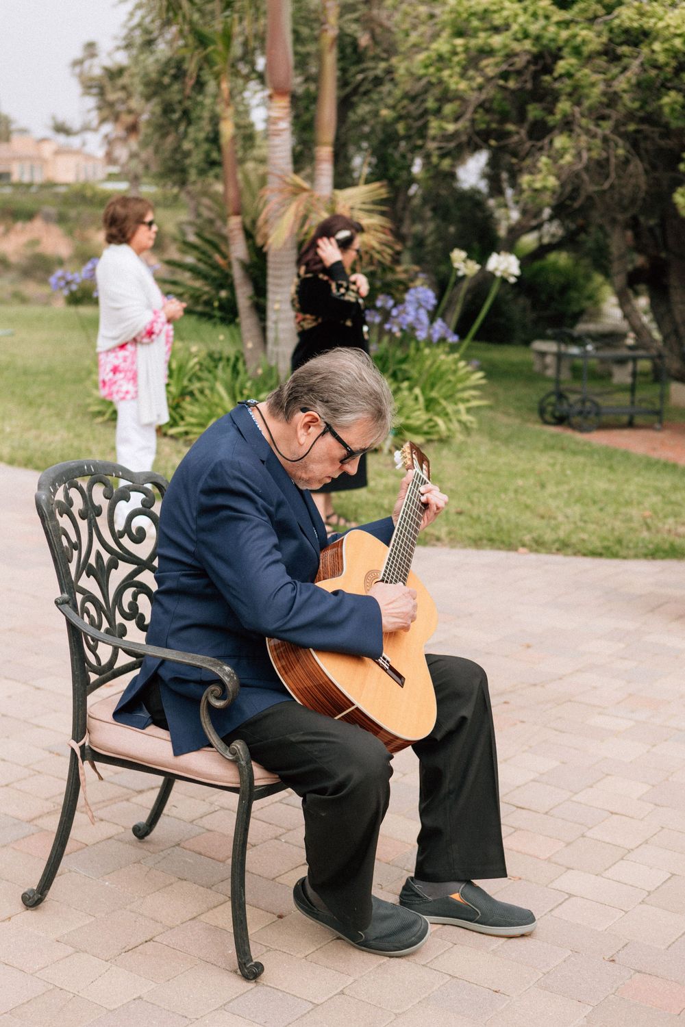 Live music by the bride's uncle during an intimate Malibu wedding ceremony.