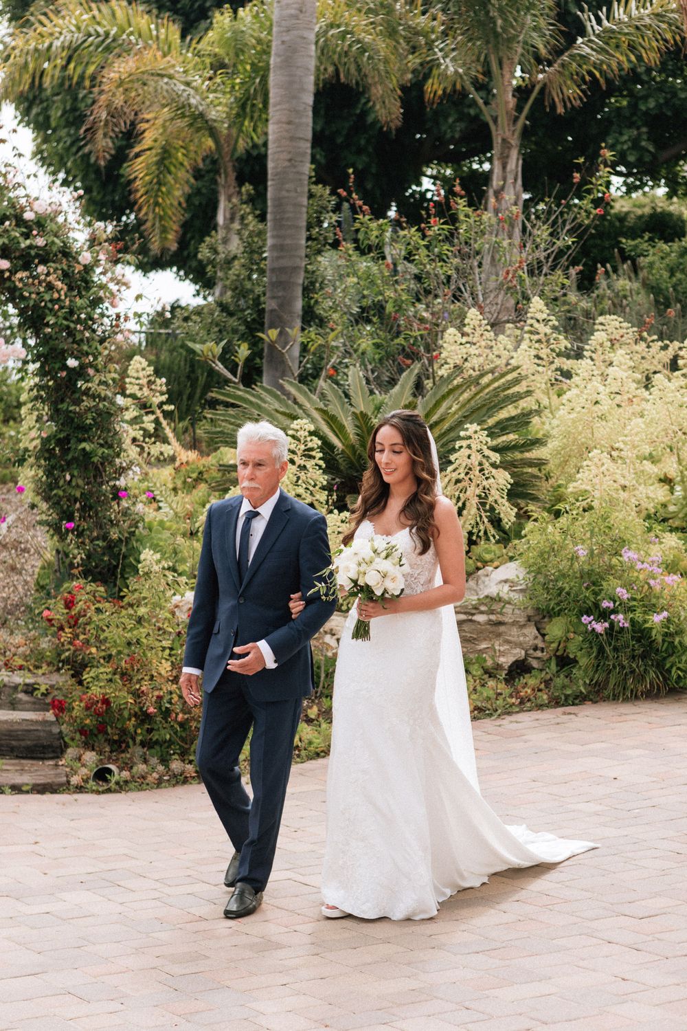 Malibu wedding photographer capturing the bride’s walk down the aisle on PCH.