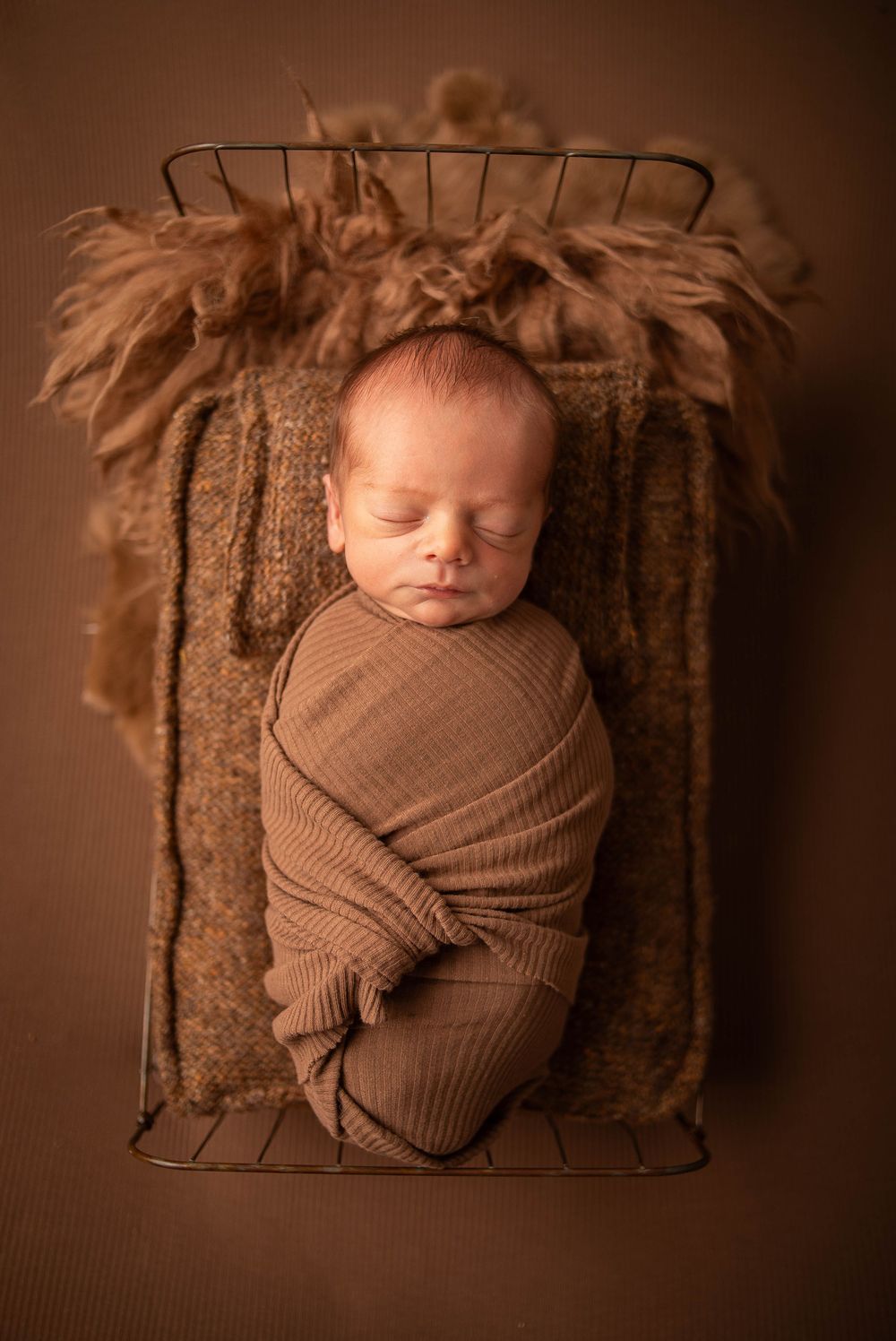 Newborn portrait photographed in a Central Louisiana studio. Baton Rouge, Watson, Denham Springs, Zachary photography