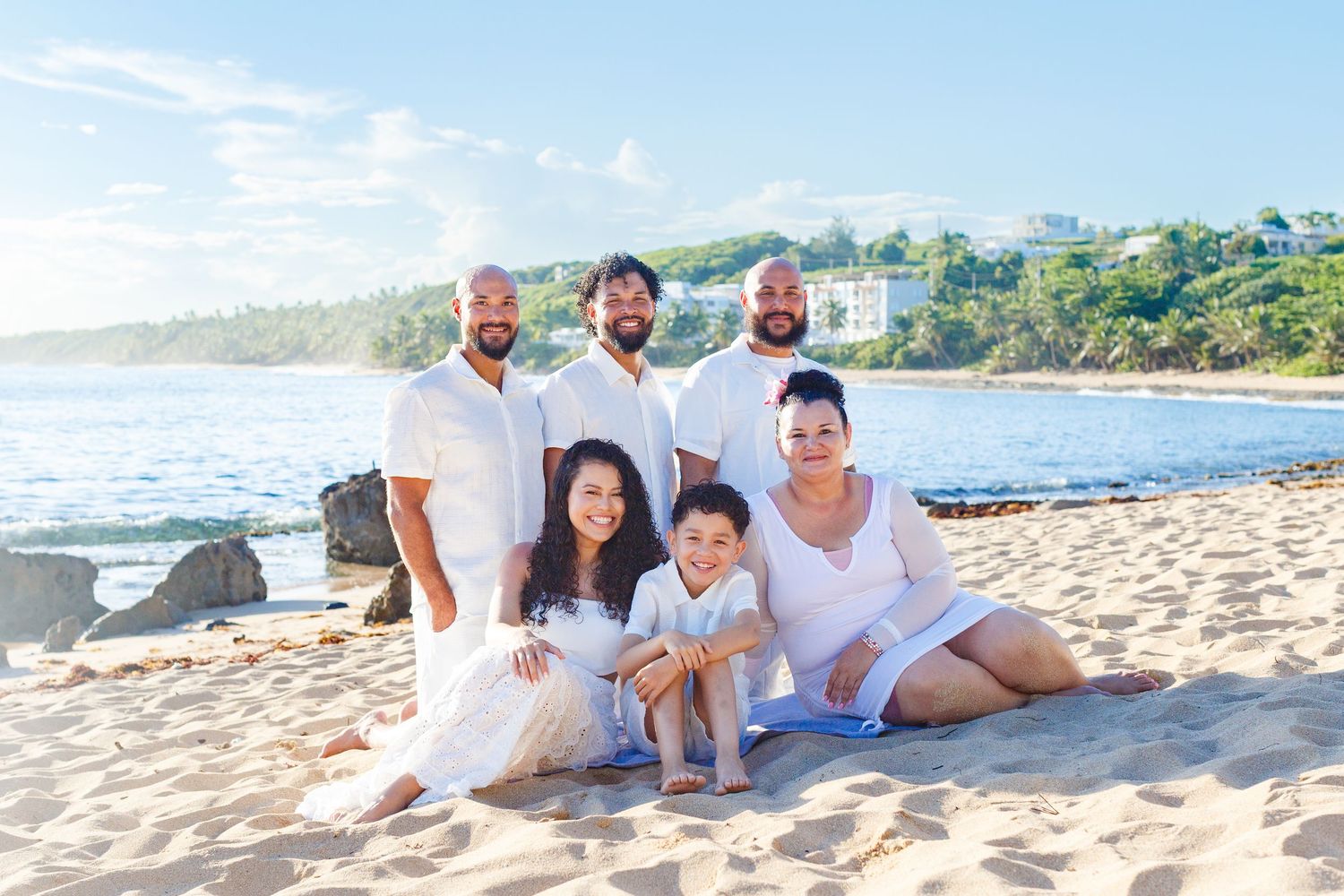 Family portrait on the beach. Playa Mar Chiquita, Puerto Rico.